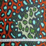 Wax Print „Leo Türkis Grün Rot“ – afrikanischer Baumwollstoff
