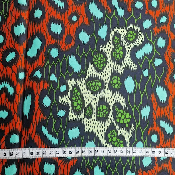 Wax Print „Leo Türkis Grün Rot“ – afrikanischer Baumwollstoff