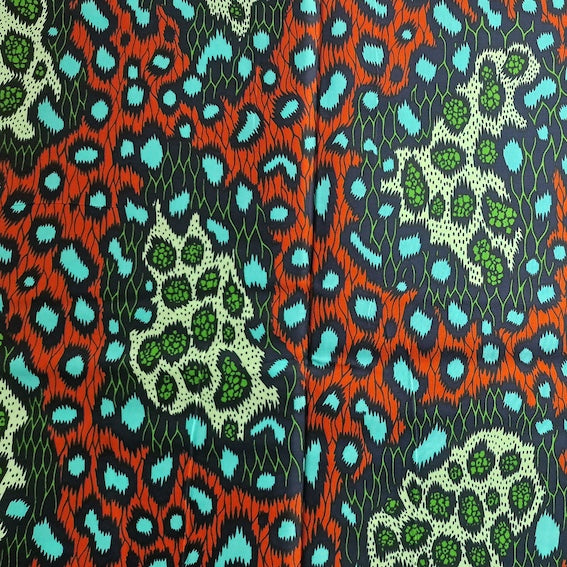 Wax Print „Leo Türkis Grün Rot“ – afrikanischer Baumwollstoff