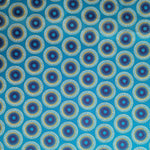 Original Shweshwe Stoff Yellow Turquoise Dandelion mit gelb-blauen Pusteblumenmotiven auf Türkis
