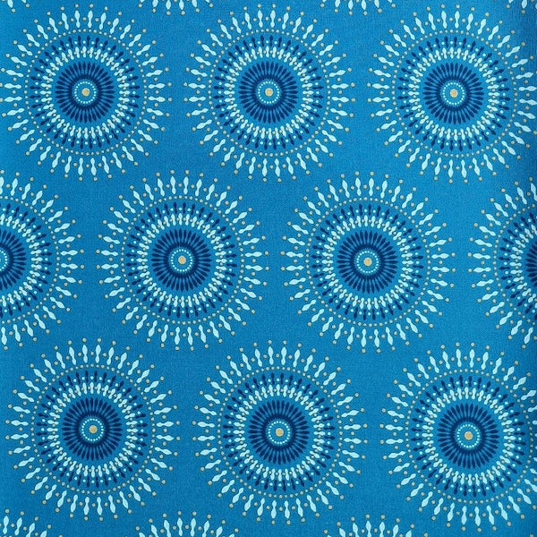 Original Shweshwe Stoff Yellow Turquoise Sun mit grossen Sonnenmotiven auf türkisblauem Hintergrund